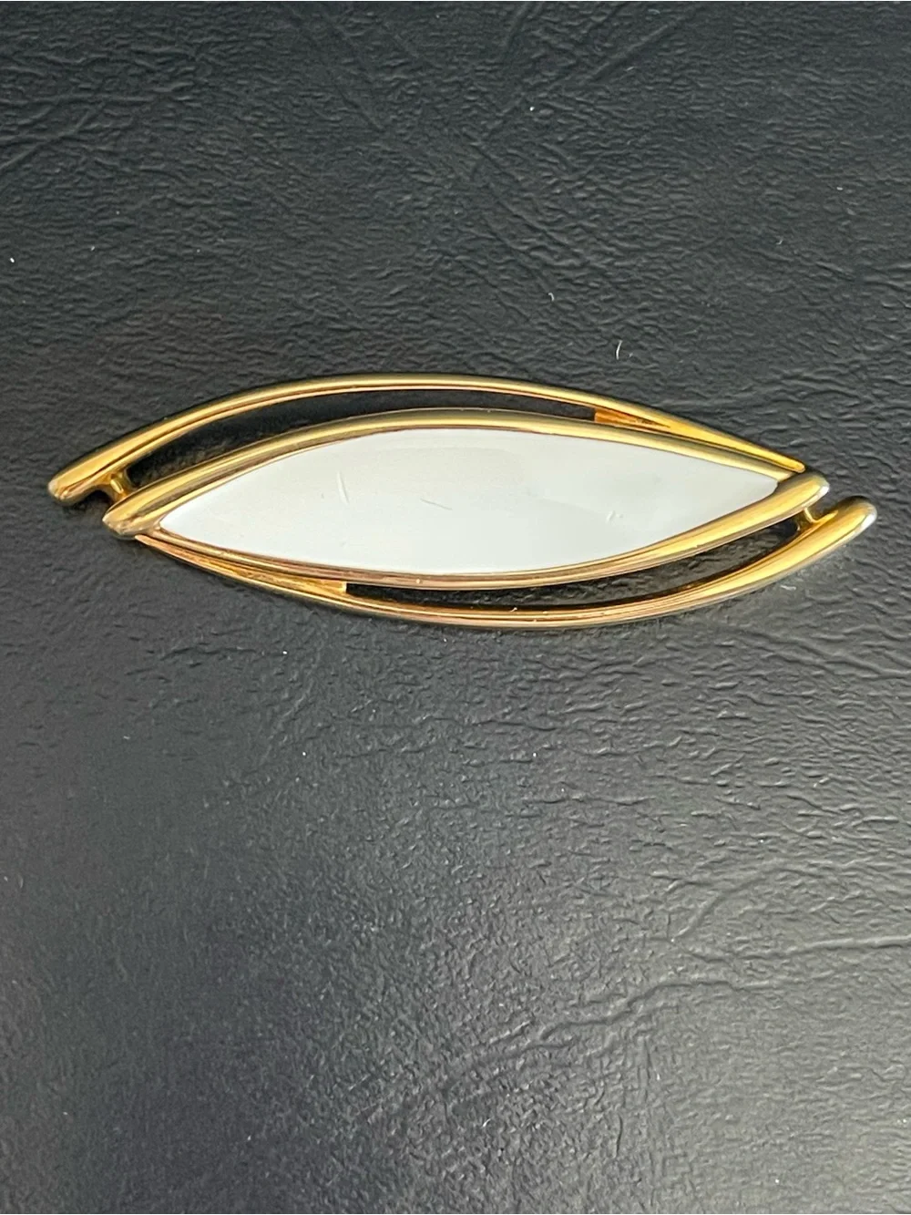 Vintage Monet Gold Tone & color enamel Marquise brooch.